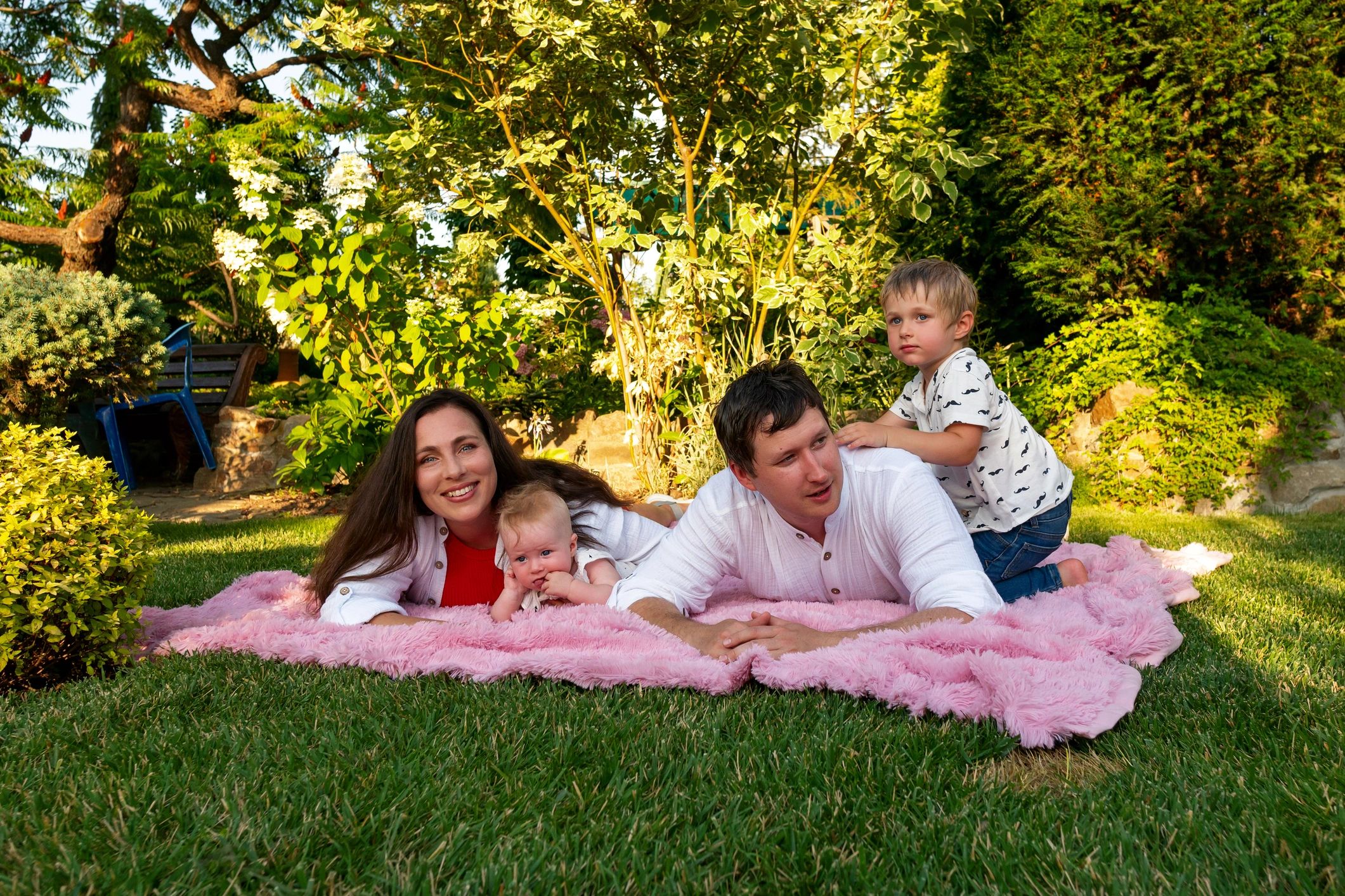 Family relaxing together with baby at home